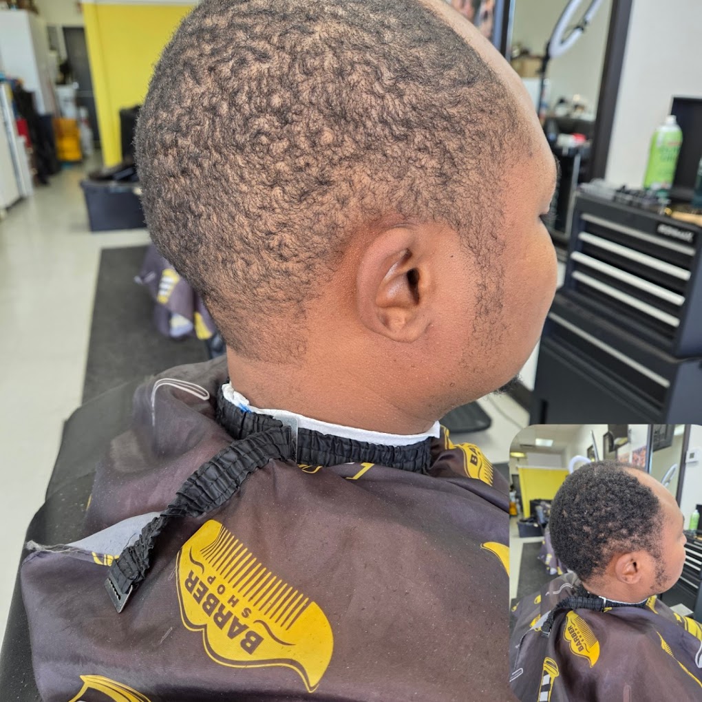 Barber at work at Roi De Klipz Barbier in LaSalle, Montreal